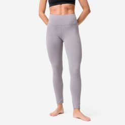 Legginsy do jogi i pilatesu Domyos. Fioletowe legginsy sportowe damskie DOMYOS, l, bez wzorów, z elastanu, na jogę i pilates. Za 119.99 zł.