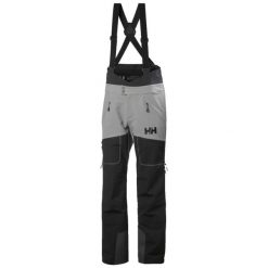 Spodnie narciarskie typu ogrodniczki Helly Hansen Odin BC Softshell. Niebieskie spodnie snowboardowe męskie Helly Hansen, na zimę, m, bez wzorów, z softshellu, narciarskie. W wyprzedaży za 1,403.50 zł.