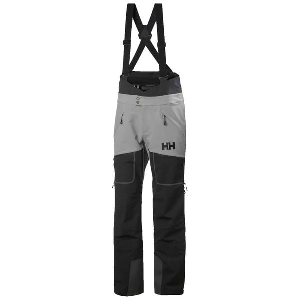 Spodnie narciarskie typu ogrodniczki Helly Hansen Odin BC Softshell. Niebieskie spodnie snowboardowe męskie Helly Hansen, na zimę, m, bez wzorów, z softshellu, narciarskie. W wyprzedaży za 1,403.50 zł.