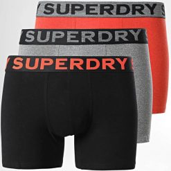 Bokserki z bawełny organicznej Superdry (x3). Brązowe bokserki męskie Superdry., m, bez wzorów, z bawełny. W wyprzedaży za 125.85 zł.