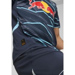 Męska trzecia koszulka RB Leipzig 24/25 PUMA Dark Night Hero Blue. Niebieskie koszulki sportowe męskie Puma, m, bez wzorów, bez kołnierzyka, bez ramiączek, do piłki nożnej. Za 398.55 zł.
