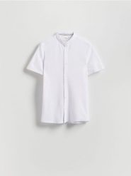 Koszula super slim fit ze stójką - biały. Białe koszule męskie Reserved, l, bez wzorów, z bawełny, bez kołnierzyka, bez ramiączek. W wyprzedaży za 49.99 zł.