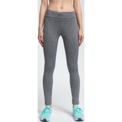 Legginsy treningowe damskie SPDF004 - średni szary melanż. Szare legginsy damskie 4f, melanż, z materiału. W wyprzedaży za 119.99 zł.