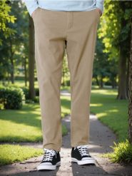 Spodnie chino slim - beżowy. Brązowe spodnie materiałowe męskie Sinsay, bez wzorów. Za 49.99 zł.