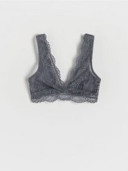 Koronkowy biustonosz - niebieski. Niebieskie biustonosze Reserved, bez wzorów, z koronki. W wyprzedaży za 45.99 zł.