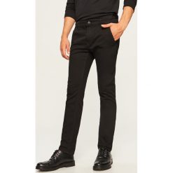 Jeansy chino slim fit - Czarny. Jeansy męskie marki Giacomo Conti. W wyprzedaży za 59.99 zł.