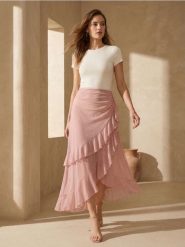 Asymetryczna spódnica midi z falbanami - różowy. Czerwone spódnice damskie Sinsay, l, bez wzorów, midi, asymetryczne. Za 29.99 zł.