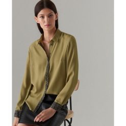 Koszula z ozdobną lamówką - Khaki. Brązowe koszule damskie Mohito, bez wzorów, bez kołnierzyka, bez ramiączek. Za 89.99 zł.