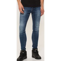Jeansy skinny - Niebieski. Niebieskie jeansy męskie House. Za 99.99 zł.