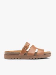 Brązowe klapki H z paskiem z klamrą. Brązowe klapki damskie Ryłko, bez wzorów, ze skóry, klasyczne, bez obcasa, na płaskiej podeszwie. Za 379.99 zł.