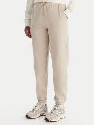 Reebok Spodnie dresowe Reebok X Ewa Chodakowska Evren RK25308CCW Beżowy Regular Fit. Brązowe spodnie dresowe damskie Reebok, xs, bez wzorów, z dresówki. Za 179.99 zł.