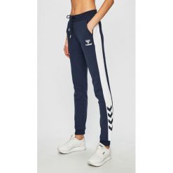 Hummel - Spodnie. Niebieskie legginsy damskie Hummel, s, bez wzorów, z bawełny, climacool (adidas). W wyprzedaży za 129.90 zł.