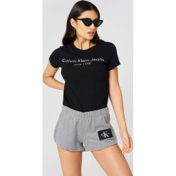 Calvin Klein Szorty True Icon Track - Grey. Szorty damskie marki Calvin Klein. Za 283.95 zł.