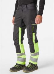 Helly Hansen Pants with reflective elements HELLY HANSEN Alna 2.0 work, yellow C58. Żółte spodnie sportowe męskie Helly Hansen, m, bez wzorów. Za 442.78 zł.