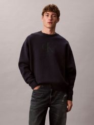 Calvin Klein Jeans sweter z dzianiny Mężczyźni niebieski, M. Niebieskie swetry przez głowę męskie Calvin Klein Jeans, m, bez wzorów, z dzianiny, bez kołnierzyka. Za 379.95 zł.