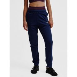 Spodnie damskie Hummel Elemental. Niebieskie legginsy damskie Hummel, bez wzorów, na fitness i siłownię. Za 132.50 zł.