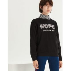 Bluza z nadrukiem - Czarny. Bluzy damskie marki KALENJI. W wyprzedaży za 24.99 zł.