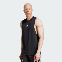 Koszulka Les Mills Graphic Tank. Czarne t-shirty męskie Adidas, xl, bez wzorów, bez kołnierzyka. Za 179.00 zł.