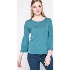 Jacqueline de Yong - Bluzka. Niebieskie bluzki damskie Jacqueline de Yong, z dzianiny, casualowe, z okrągłym kołnierzem. W wyprzedaży za 29.90 zł.