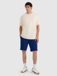 4F Spodenki dresowe regular męskie - granatowe S. Niebieskie krótkie spodenki sportowe męskie 4f, l, bez wzorów, z bawełny. Za 79.99 zł.