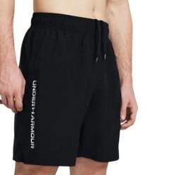 Spodnie treningowe męskie Under Armour 1383356001. Białe spodnie sportowe męskie Under Armour, m, bez wzorów, z materiału, na fitness i siłownię. Za 206.99 zł.
