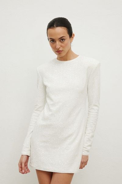 Sukienka z cekinami w kolorze CREM- CONFETTI -S. Sukienki damskie Marsala, na imprezę, l, bez wzorów, eleganckie, bez kołnierzyka, bez ramiączek, mini, dopasowane. Za 339.90 zł.