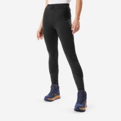 Legginsy turystyczne damskie Quechua NH500 Warm. Czarne legginsy damskie QUECHUA, m, bez wzorów, z materiału, trekkingowe. Za 199.99 zł.