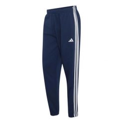Spodnie dresowe tapered adidas Essentials 3-Stripes Fleece Cuffed. Białe spodnie sportowe męskie Adidas, m, bez wzorów, z dresówki, na fitness i siłownię. Za 311.99 zł.