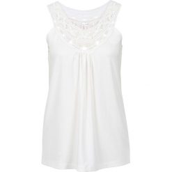 Top z koronką bonprix biel wełny. Topy damskie marki DOMYOS. Za 79.99 zł.