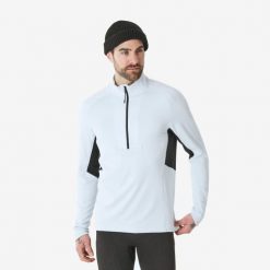 Koszulka termoaktywna narciarska męska Quechua BL 500 1/2 Zip. Czarne koszulki sportowe męskie WED'ZE, na zimę, l, bez wzorów, z elastanu, bez kołnierzyka, bez ramiączek, narciarskie. Za 89.99 zł.