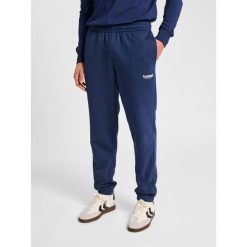 Spodnie do biegania Hummel Legacy 2.0. Niebieskie spodnie sportowe męskie Hummel, na lato, bez wzorów, z dresówki, do biegania. Za 261.50 zł.