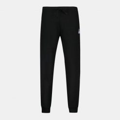 Wąskie spodnie do biegania Le Coq Sportif Pantalon de jogging ample Le Coq Sport. Czarne krótkie spodenki sportowe męskie le coq sportif, xl, z aplikacjami, z bawełny, do biegania. Za 319.00 zł.