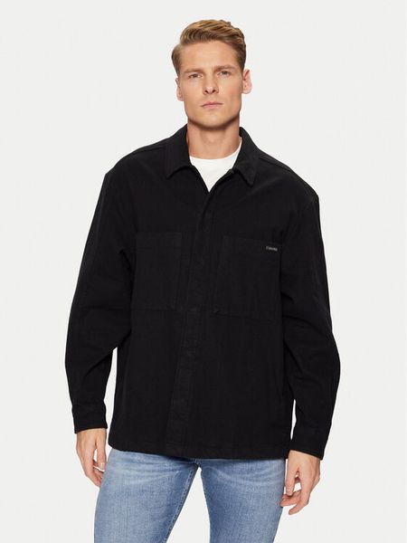 Calvin Klein Jeans Koszula J30J327108 Czarny Relaxed Fit. Czarne koszule męskie Calvin Klein Jeans, m, bez wzorów, z bawełny, bez kołnierzyka, bez ramiączek. Za 299.99 zł.