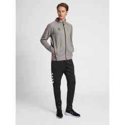 Bluza dresowa zapinana na zamek błyskawiczny Hummel Cima XK. Szare bluzy sportowe męskie Hummel, xl, bez wzorów, z dresówki, bez kaptura, do piłki ręcznej. W wyprzedaży za 225.20 zł.