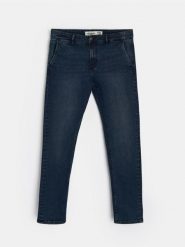 Spodnie jeansowe chino slim fit - niebieski. Niebieskie spodnie materiałowe męskie Sinsay, bez wzorów, z jeansu. Za 79.99 zł.
