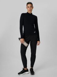 4F Spodnie do biegania szybkoschnące damskie - czarne M. Czarne spodnie sportowe damskie 4f, l, bez wzorów, z materiału, do biegania. Za 249.99 zł.