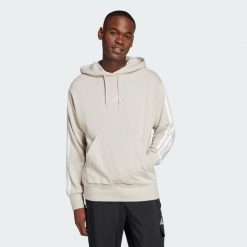 Bluza z kapturem Essentials 3-Stripes French Terry. Białe bluzy męskie Adidas, xl, bez wzorów, z materiału, z kapturem, na fitness i siłownię. Za 222.00 zł.