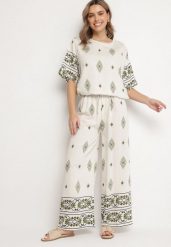 Beżowo-Ciemnozielony Wiskozowy Komplet w Stylu Boho Szerokie Spodnie i Bluzka T-shirt Sarilorae. Zielone bluzki damskie Born2be, l, bez wzorów, z wiskozy, boho, bez kołnierzyka, bez ramiączek. Za 84.99 zł.