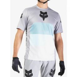 Koszulka rowerowa męska Fox Ranger SS Jersey Grid. Szare buty sportowe męskie FOX, m, bez wzorów, z jersey, bez kołnierzyka, bez ramiączek, rowerowe. Za 226.00 zł.