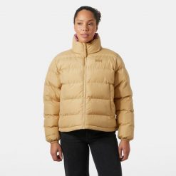 Damska kurtka puchowa Helly Hansen YU 23. Brązowe kurtki damskie Helly Hansen, bez wzorów, z puchu, bez kaptura. W wyprzedaży za 690.50 zł.