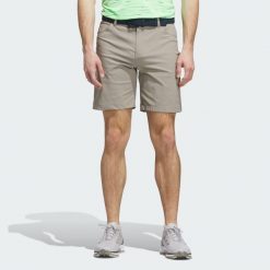 Szorty Ultimate365 5-Pocket Golf. Brązowe krótkie spodenki sportowe męskie Adidas, m, bez wzorów, z materiału, na golfa. Za 349.00 zł.