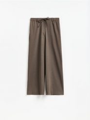 Spodnie z wiązaniem - brązowy. Brązowe spodnie materiałowe damskie Reserved, l, bez wzorów, z tkaniny. Za 139.99 zł.