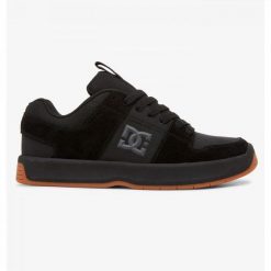 Buty do chodzenia męskie DC Lynx Zero. Czarne buty sportowe męskie DC Shoes, z materiału, bez zapięcia, trekkingowe. W wyprzedaży za 313.90 zł.