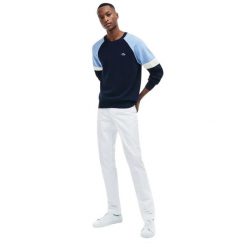 Spodnie turystyczne męskie Lacoste. Białe eleganckie spodnie męskie Lacoste, m, bez wzorów, z bawełny. Za 287.00 zł.