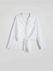 Koszula z wiązaniem - biały. Białe koszule damskie Reserved, l, bez wzorów, z materiału, bez kołnierzyka, bez ramiączek. W wyprzedaży za 29.99 zł.