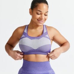 Stanik fitness cardio Domyos 560. Niebieskie obuwie sportowe damskie DOMYOS, bez wzorów, z elastanu, na fitness i siłownię. Za 99.99 zł.