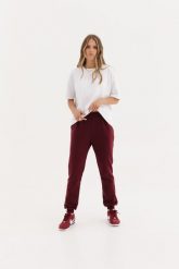 LEKKIE SPODNIE CELINE BORDOWE S - Flawless. Czerwone spodnie dresowe damskie Flawless, s, bez wzorów, z bawełny. Za 231.00 zł.