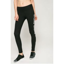 Reebok - Legginsy. Szare legginsy damskie Reebok, z nadrukiem, z bawełny. W wyprzedaży za 99.90 zł.