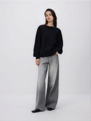 Gładka bluza z bawełną - czarny. Czarne bluzy damskie Reserved, l, bez wzorów, z bawełny, bez kaptura. Za 89.99 zł.