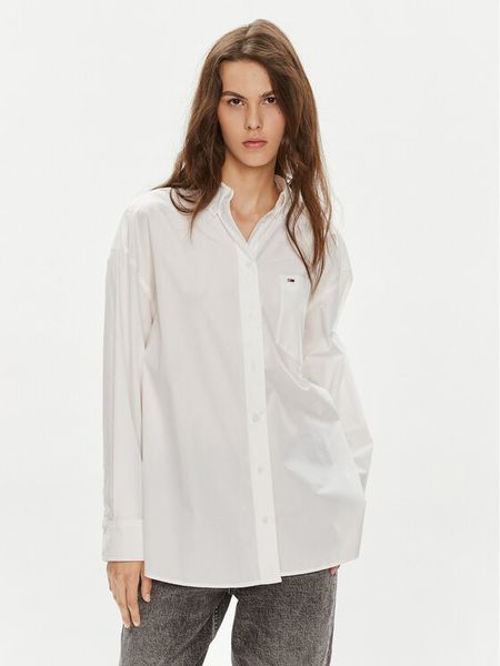Tommy Jeans Koszula Essential DW0DW18659 Biały Oversize. Białe bluzki damskie Tommy Jeans, m, bez wzorów, z bawełny, bez kołnierzyka, bez ramiączek. Za 299.99 zł.